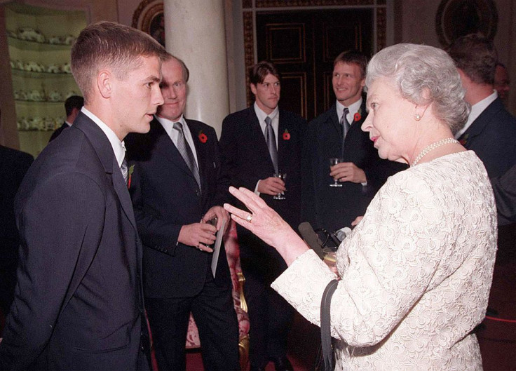 File photo of Queen Elizabeth and Michael Owen