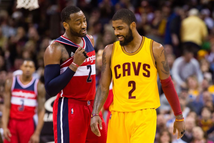 John Wall #2 of the Washington Wizards talks with Kyrie Irving #2 of the Cleveland Cavaliers