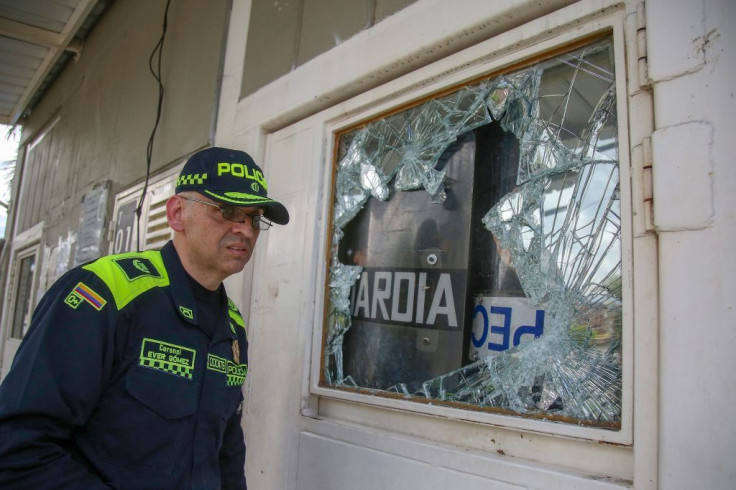 A policeman outside the prison in Tulua, Valle del Cauca Department, Colombia