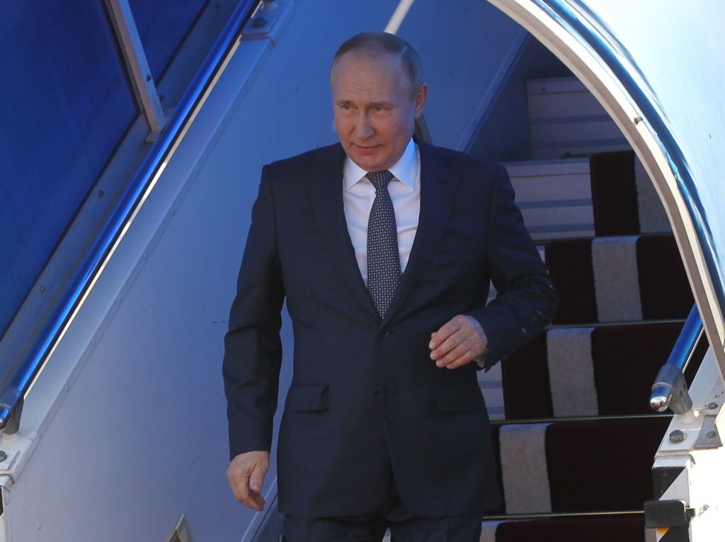 Vladimir Putin's Arm Appears To Hang Limp As He Emerges From Plane In 