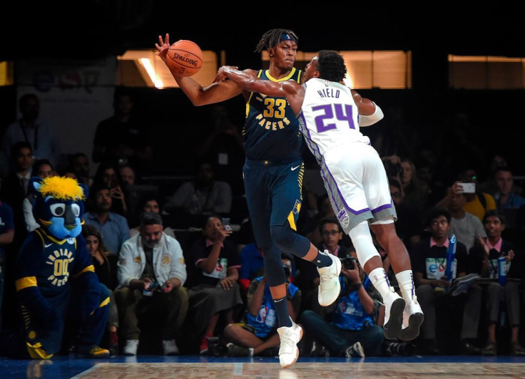 Indiana Pacers player Myles Turner (L) and Sacramento Kings player Buddy Hield