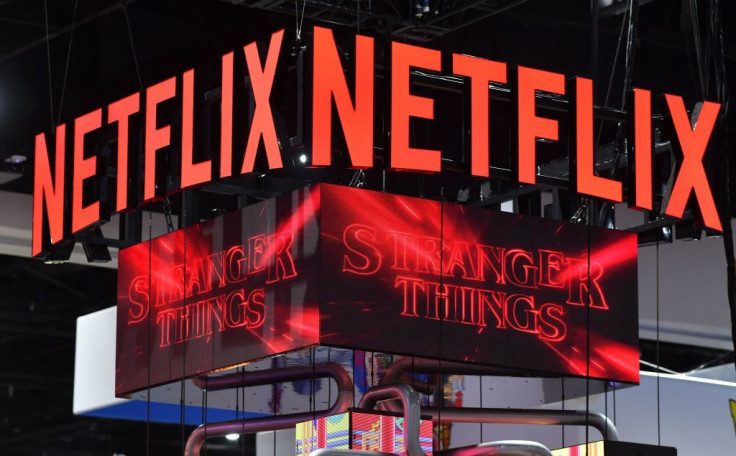 The Netflix booth advertises Stranger Things Season 4 on a screen during Comic-Con International in San Diego, California