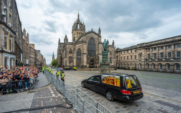 The hearse carrying the coffin of Queen Elizabeth II passes St Giles' Cathedral in Edinburgh