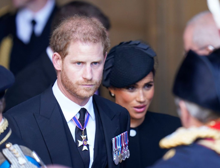 Prince Harry and Meghan leave Westminster Hall, London after the coffin of Queen Elizabeth II was brought to the hall