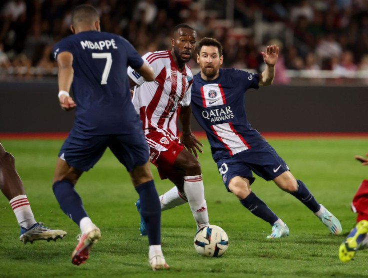 Cedric Avinel of Ajaccio, Lionel Messi and Kylian Mbappé of PSG