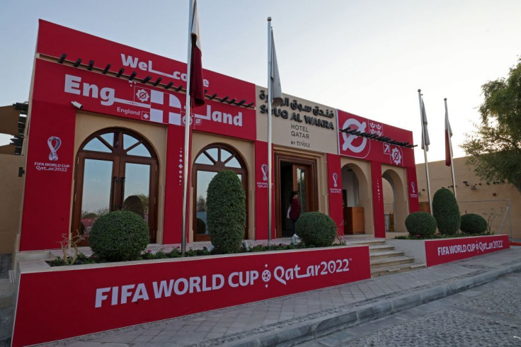 A woman stands at the entrance of the Souq al-Wakra Hotel, which will serve as a base camp for the England national football team