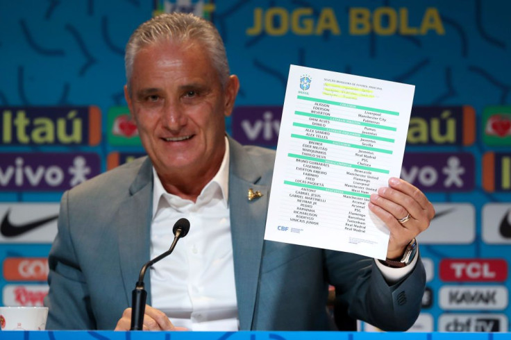 Tite coach of Brazil shows the list with the players during a press conference 
