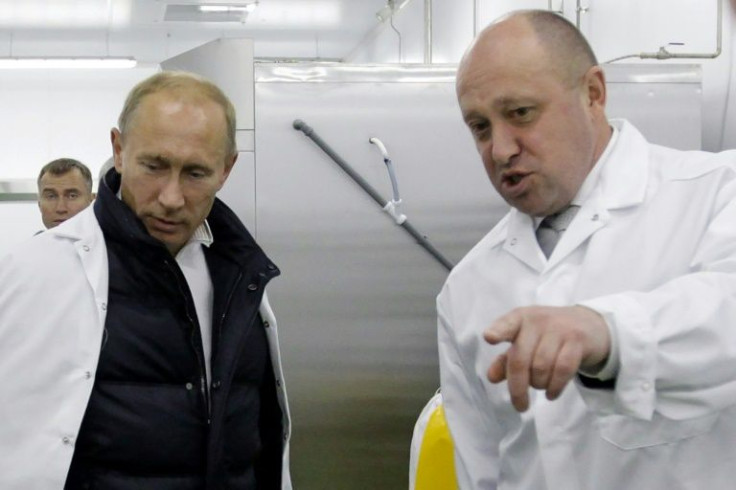 Yevgeny Prigozhin (R) and Vladimir Putin