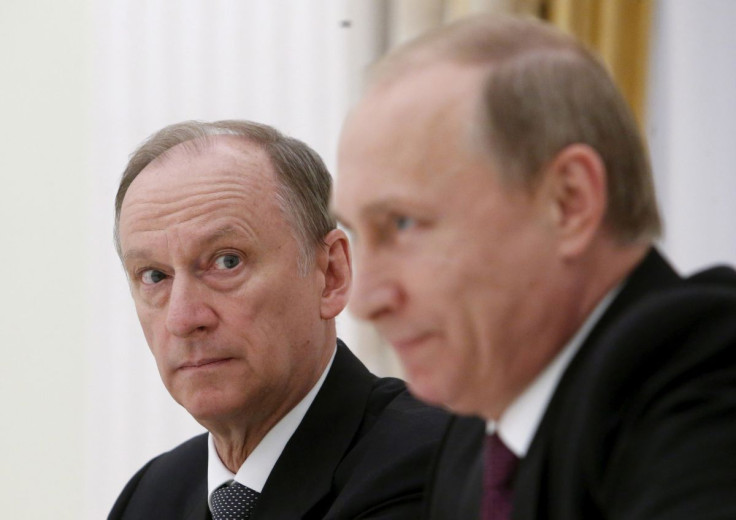Russian Security Council Secretary Nikolai Patrushev (L) And President Vladimir Putin