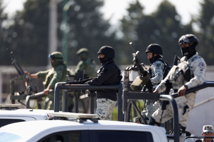 Security forces stand outside of high security prison where Mexican drug leader Ovidio Guzman is imprisoned