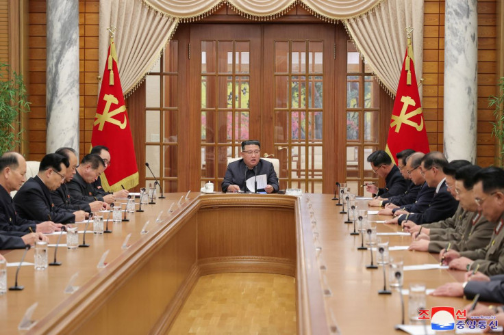 Kim Jong Un attends the 11th Meeting of the Political Bureau of the 8th Central Committee