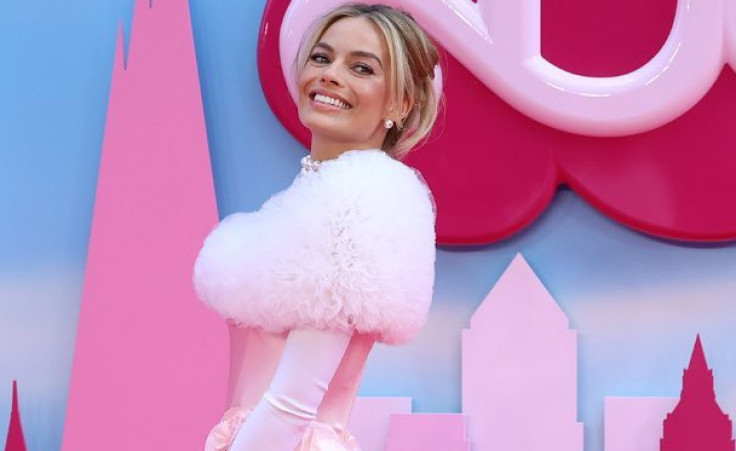 Margot Robbie as Barbie