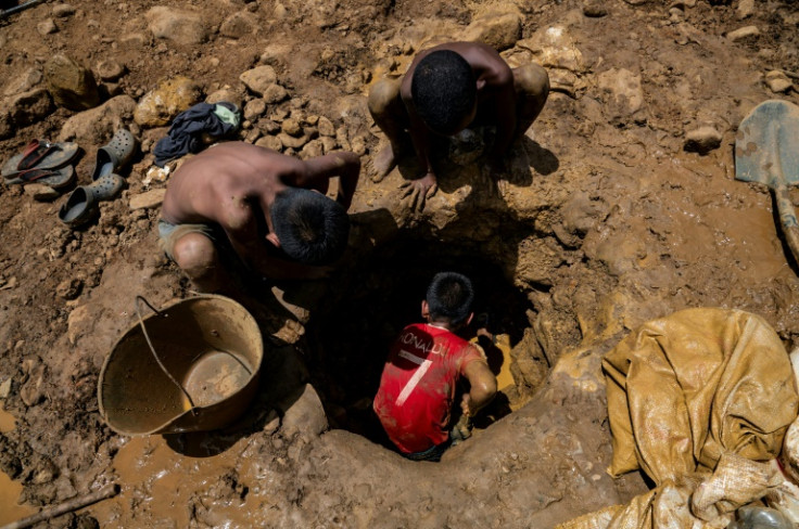 Children shimmy into narrow wells