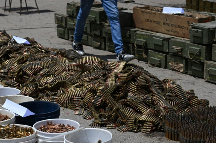 Buckets of Bullets and Ammunition Belts