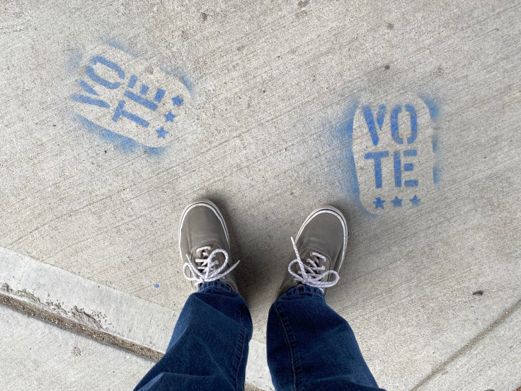 Vote signage on pavement