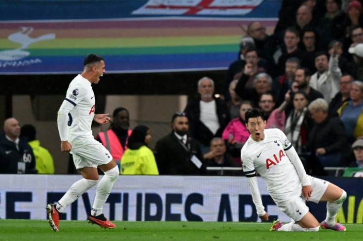 Tottenham's Son Heung-min (R) celebrates after scoring against Fulham.