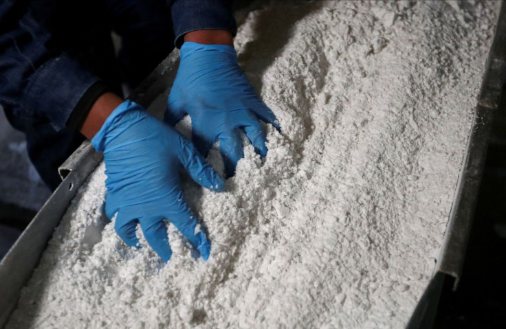 An employee grabs carbonate lithium in Argentina