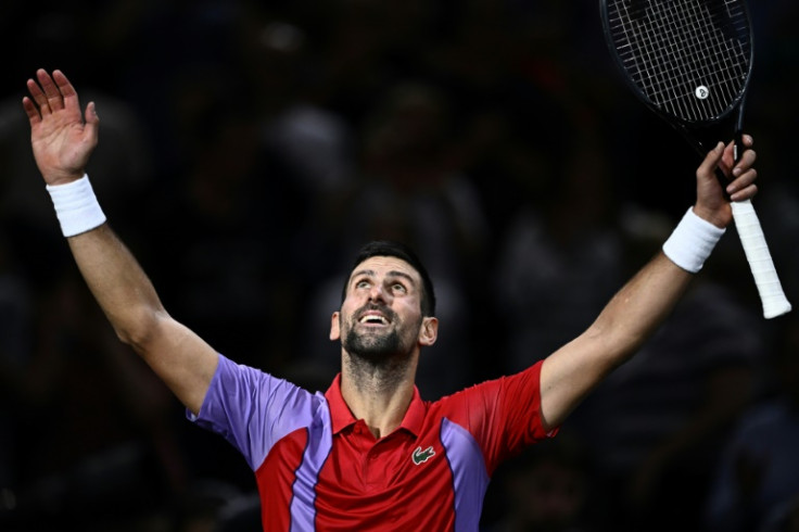 Novak Djokovic celebrates after beating Tomas Martin Etcheverry