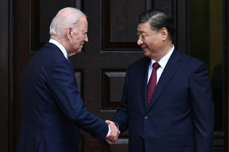 US President Joe Biden greets Chinese President Xi Jinping 