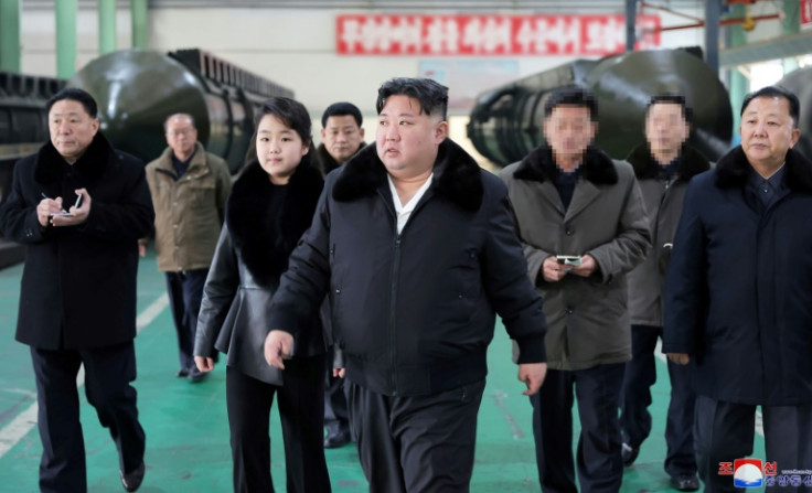 Kim Jong Un inspects a missile launcher production facility