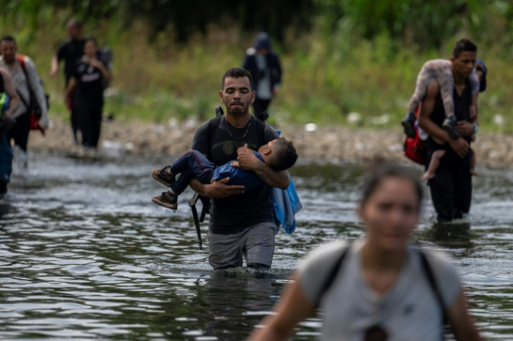 Migrants cross the Darien Province in Panama