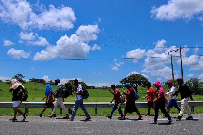 Venezuelans take part in a caravan toward the U.S.
