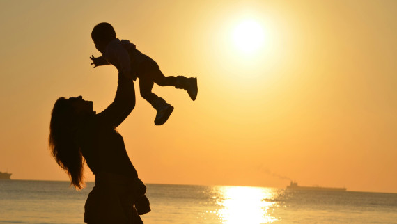 Silhouette of a woman and a child