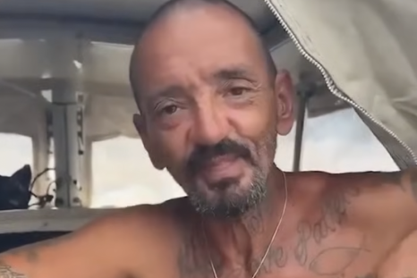 Joseph Malinowski, known online as "Lieutenant Dan," on his sailboat.