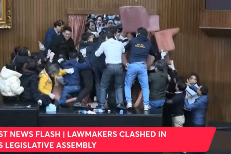 Taiwan lawmakers brawl barricade