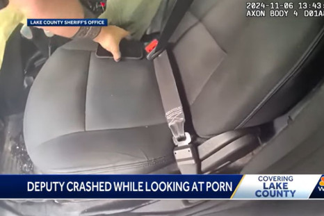 Deputy crashes car looking at porn