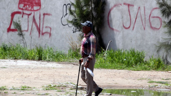 The initials of the CJNG painted on a Jalisco wall