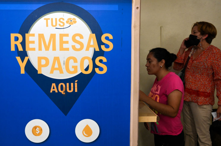 Woman withdraws remittance from U.S. in Guatemala