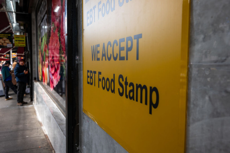 People shop for food in a Brooklyn neighborhood