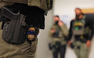 An ICE officer's badge