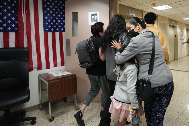 A family of immigrants following a court hearing
