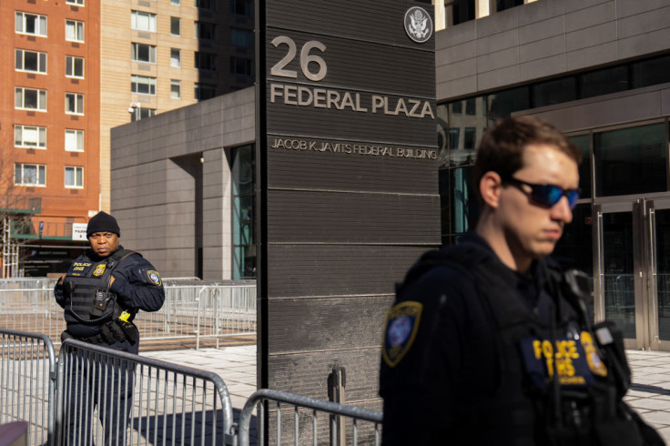 Homeland Security officers stand guard at 26 Federal Plaza