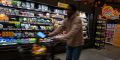 People shop at a grocery store in Brooklyn