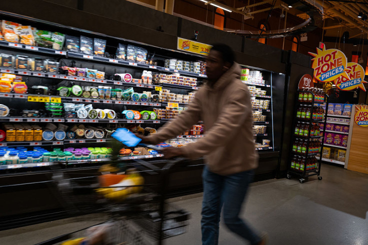 People shop at a grocery store in Brooklyn