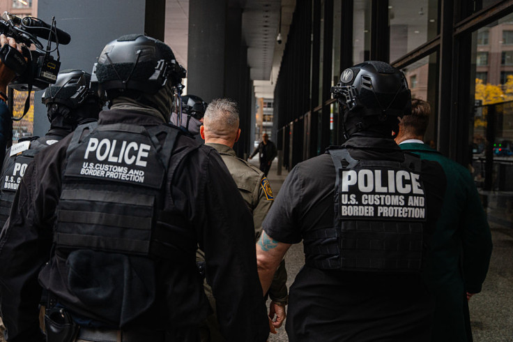 Border Patrol pushes through a crowd