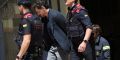 Jonathan Andic is escorted by Catalan regional police officers