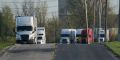 Semi-trucks are parked outside a FedEx facility in Indianapolis
