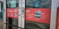 A sign indicates the store accepts SNAP benefits