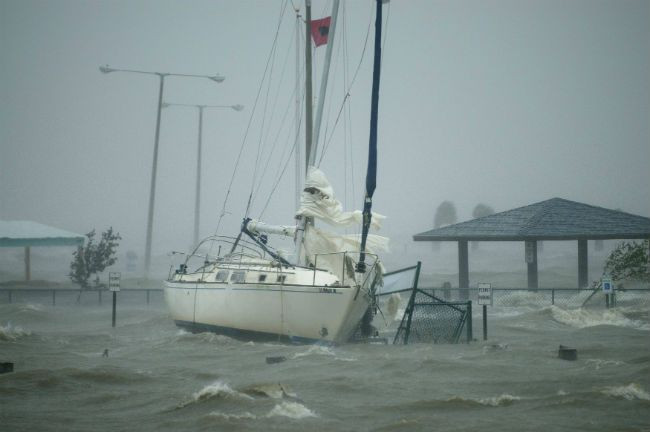 Isaac Makes Landfall, Overtops Levee