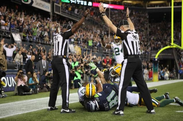 When the players hit the ground in the end zone, the officials determined that both Tate and Jennings had possession of the ball. Under the rule for simultaneous catch, the ball belongs to Tate, the offensive player. The result of the play was a touchdo