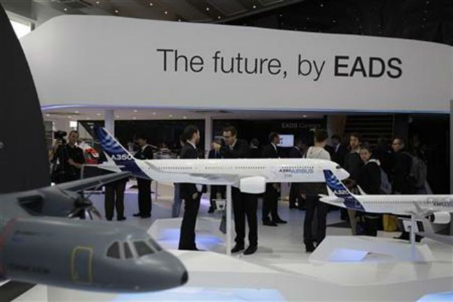 EADS says continuing BAE merger talks with governments