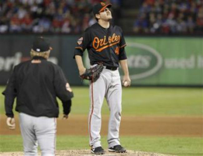 Orioles stun Rangers 5-1 to win wildcard