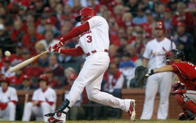 Cards crush Nats to tie playoff series