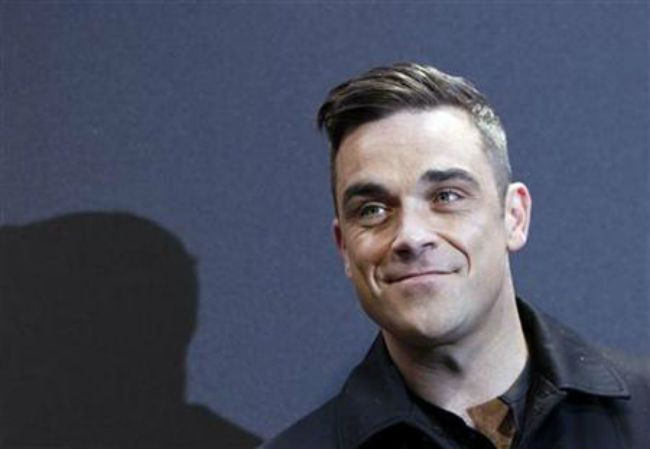 Robbie Williams Aims to Seal Solo Legacy with Tour