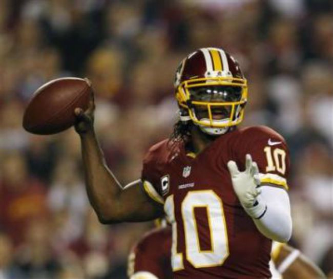 Redskins edge Giants to continue playoff push