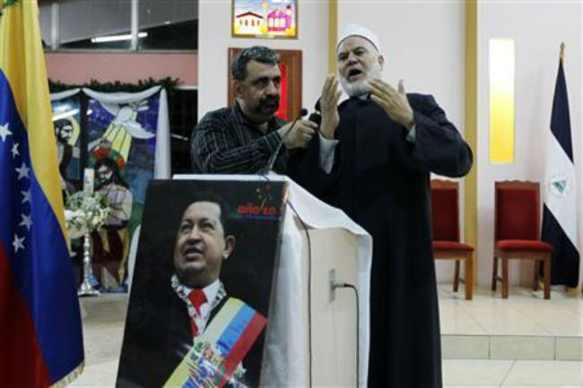 Venezuela's Chavez improving after surgery complications